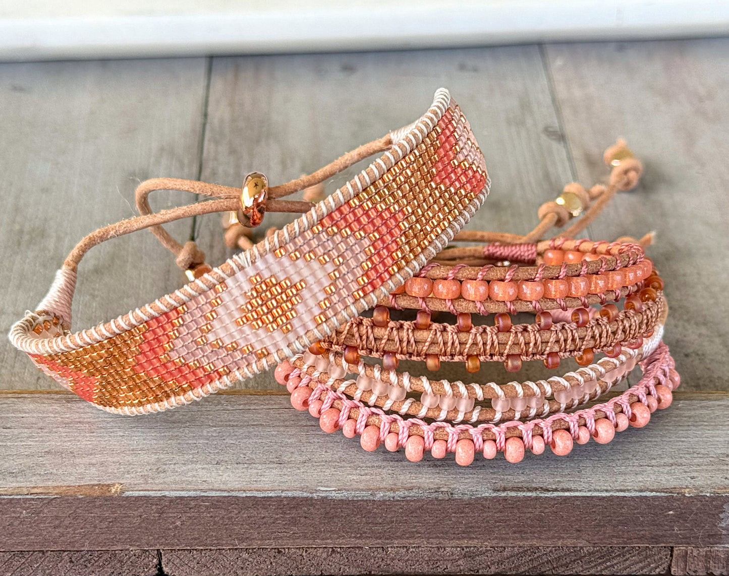 Peachy Coral and Tan Adjustable Bead Loom Woven bracelet with leather trim
