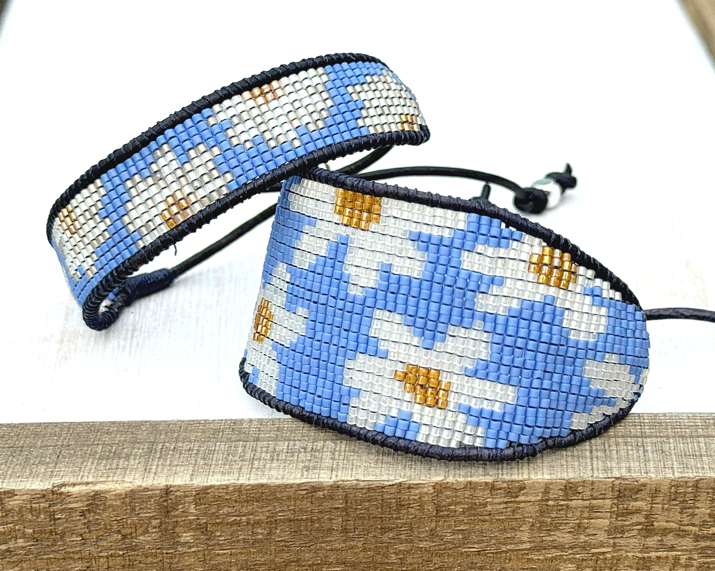Blue and white boho flower bead loom woven bracelet with slide adjustment