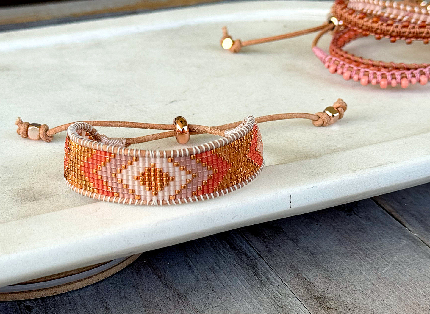 Peachy Coral and Tan Adjustable Bead Loom Woven bracelet with leather trim