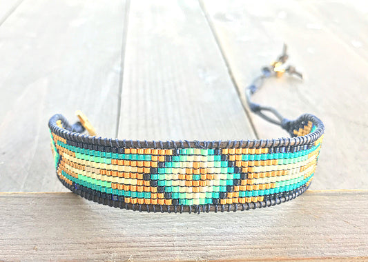 Gold, Navy, and Seafoam Starburst Bead Loom Woven Leather bracelet