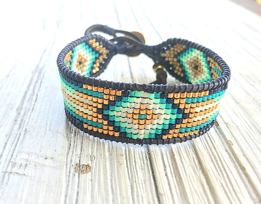 Gold, Navy, and Seafoam Starburst Bead Loom Woven Leather bracelet