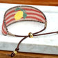 Lemon beaded bracelet with pink stripes