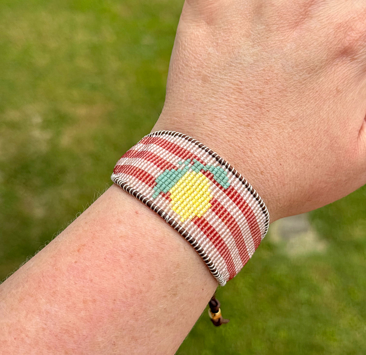 Lemon beaded bracelet with pink stripes