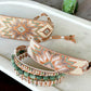 Sage, Ivory, Copper Starburst beaded loom woven bracelet trimmed with leather