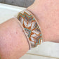 Sage, Ivory, Copper Starburst beaded loom woven bracelet trimmed with leather