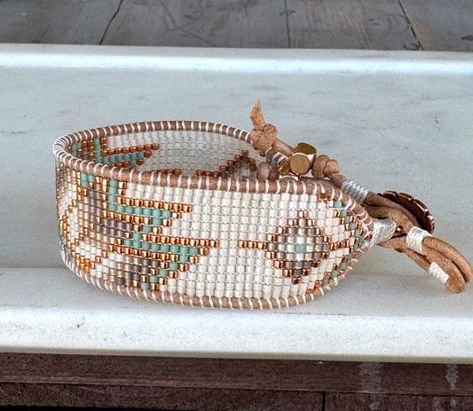 Sage, Ivory, Copper Starburst beaded loom woven bracelet trimmed with leather