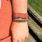 Western Sunrise Bead Loom Woven American Landscape Leather trimmed, adjustable bracelet