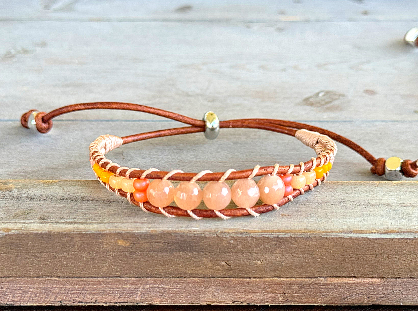 Sunstone, sunshine, peach fuzz, coral and glass bead Adjustable Leather Bracelet