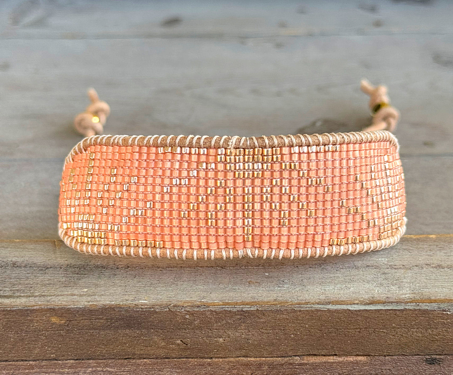 Slide adjustable peach and gold bead loom woven bracelet