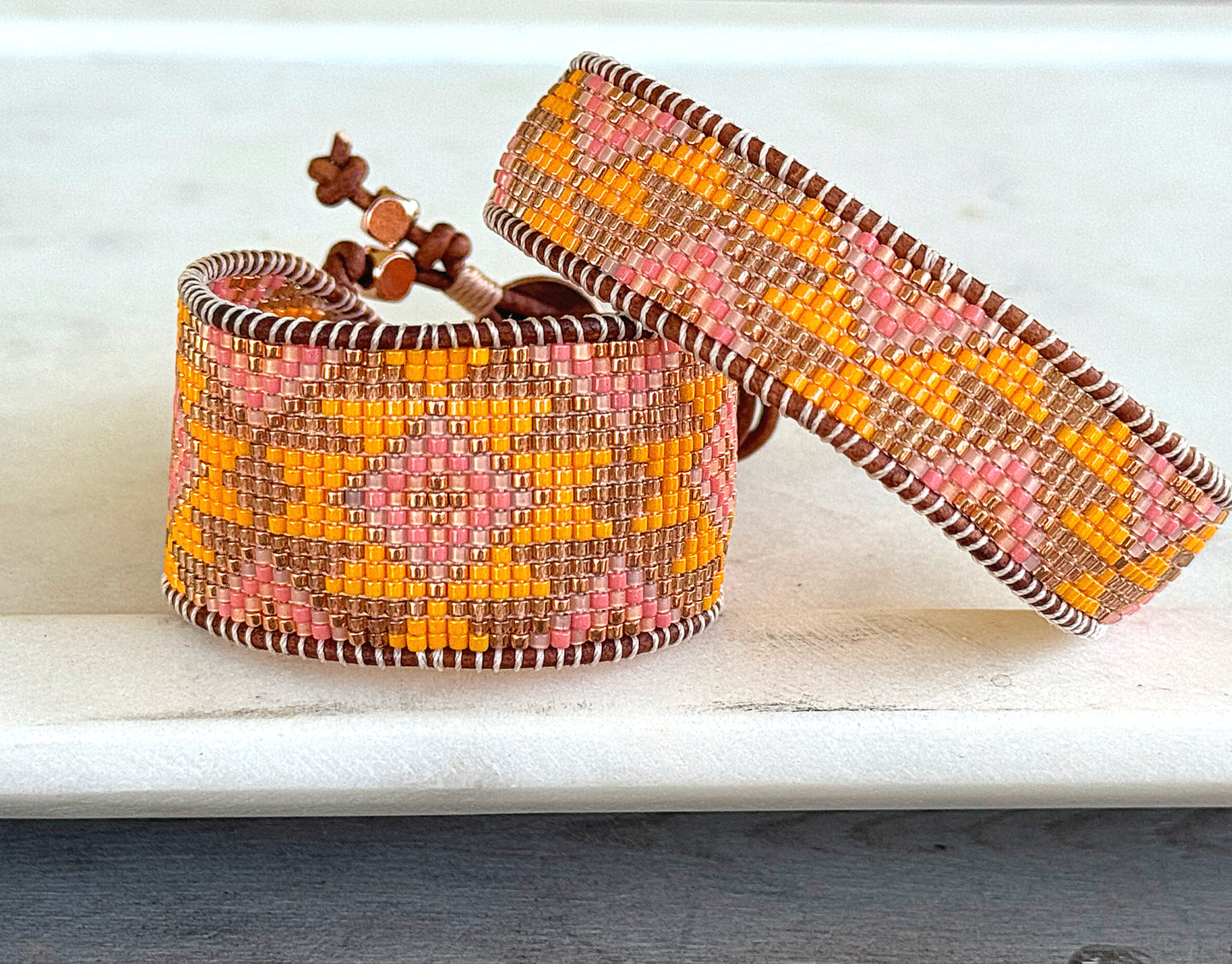 Sunshine, Peach Fuzz, and Coral Loom woven western beaded friendship bracelet