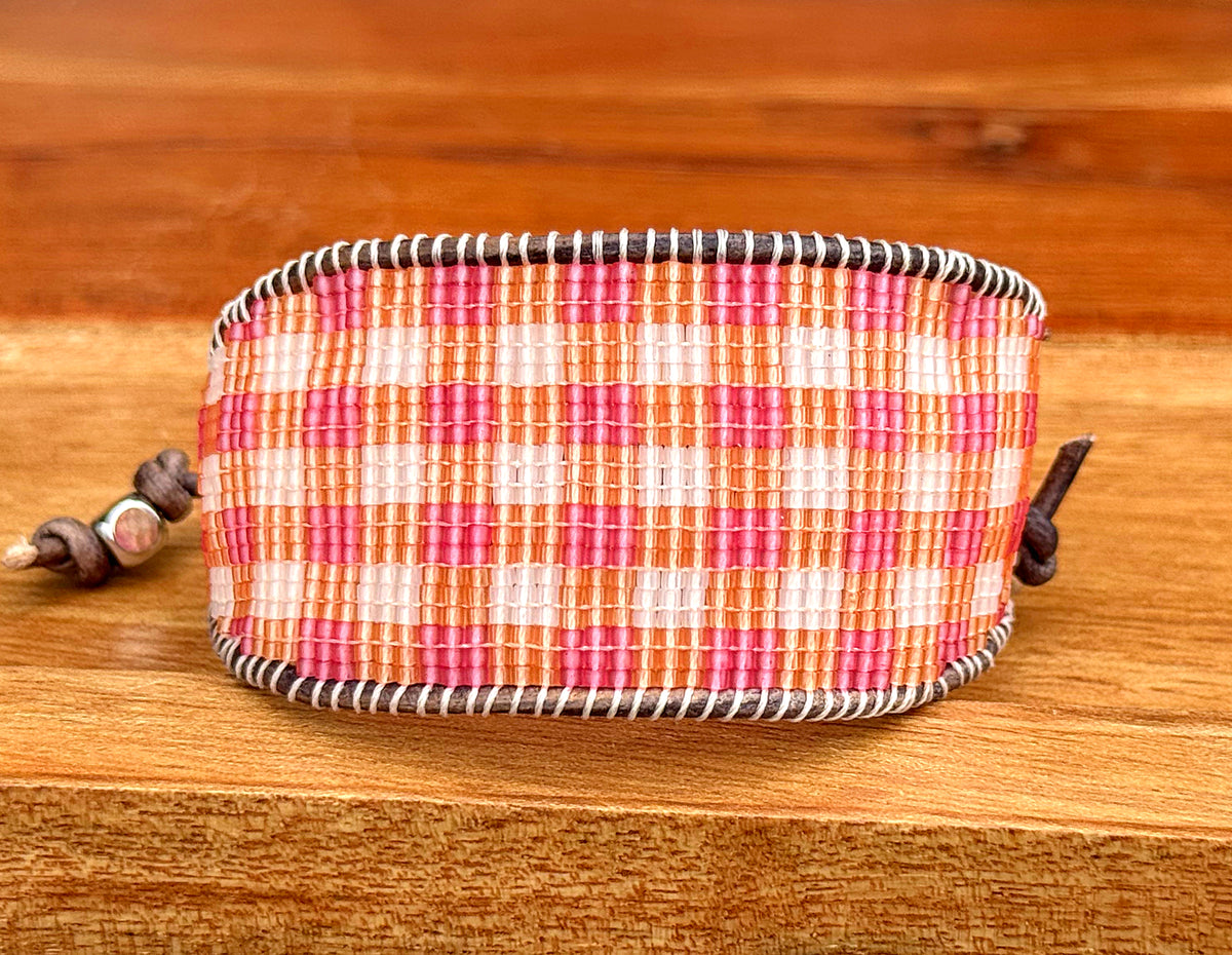 Pink and orange Gingham Bead Loom woven bracelet with adjustable leather trim