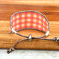 Pink and orange Gingham Bead Loom woven bracelet with adjustable leather trim