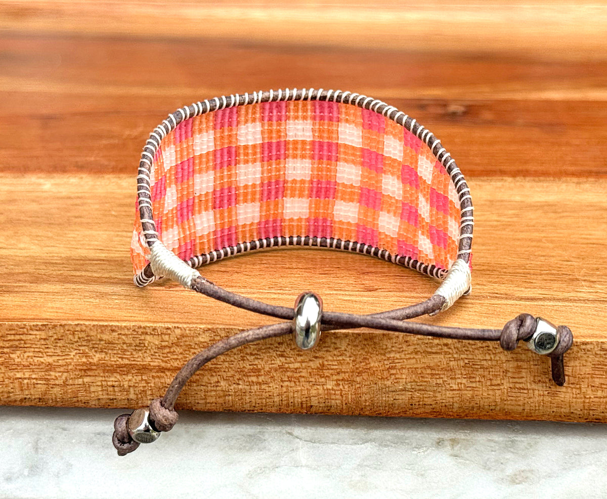 Pink and orange Gingham Bead Loom woven bracelet with adjustable leather trim