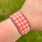 Pink and orange Gingham Bead Loom woven bracelet with adjustable leather trim