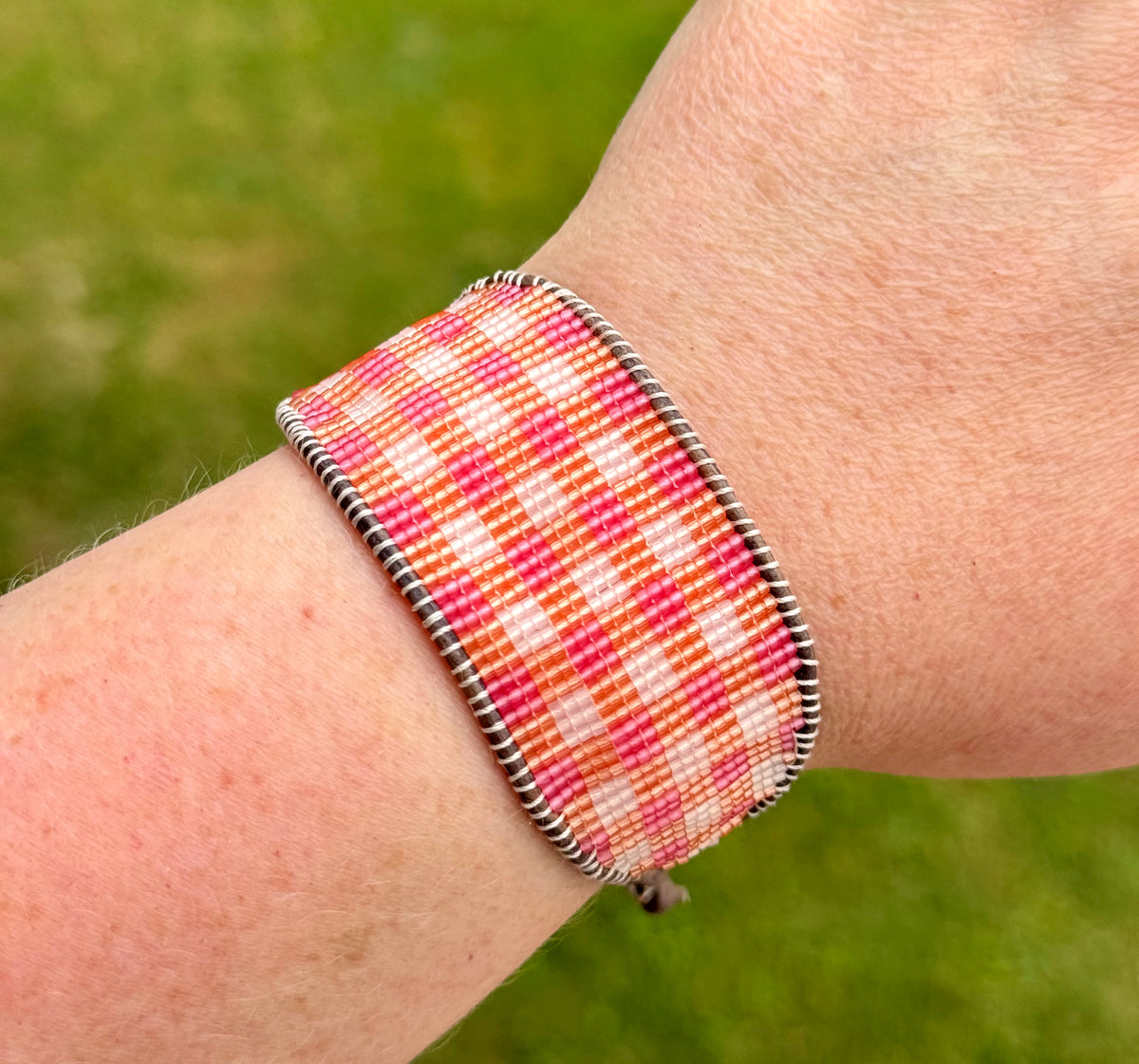 Pink and orange Gingham Bead Loom woven bracelet with adjustable leather trim
