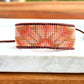 Beige, Blush, and Copper Starburst Bead Loom Woven Bracelet with slide adjustable leather