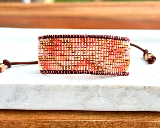 Beige, Blush, and Copper Starburst Bead Loom Woven Bracelet with slide adjustable leather