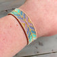 Purple, Green, and Gold Geometric Arrow Bead Loom Woven Bracelet